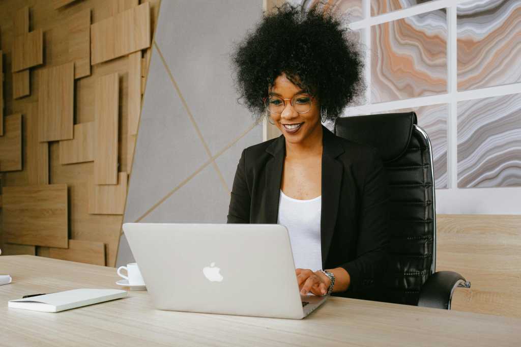 confident business user at laptop